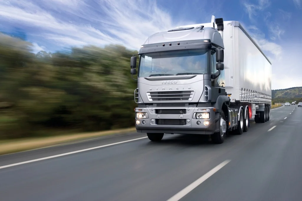 Road freight truck on a highway for inland delivery