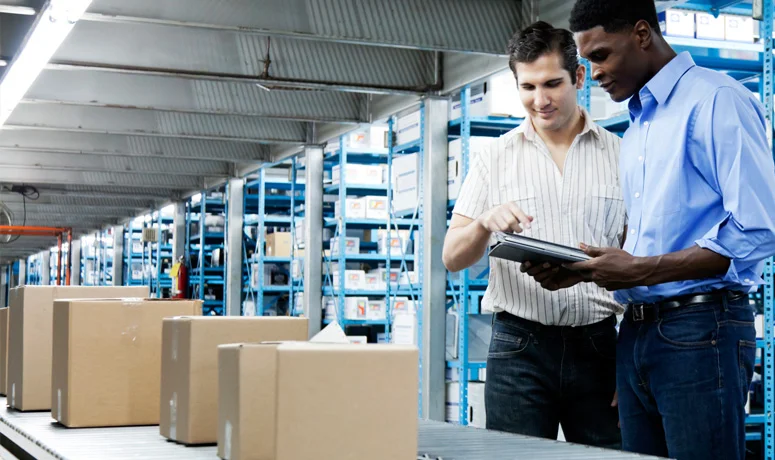 Ausken team checking commercial cargo in a warehouse